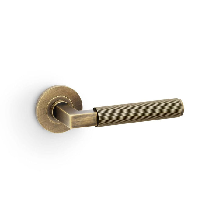 Hurricane Reeded Lever on Rose (A/W) Pair - Antique Brass (AB)