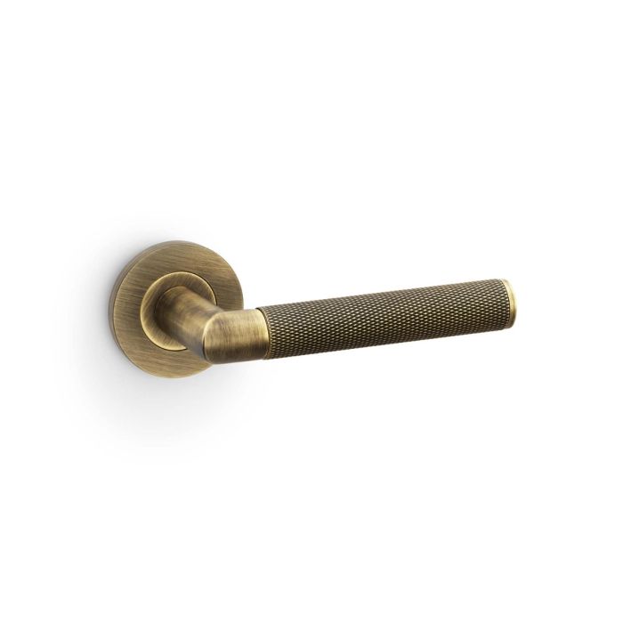 Harrier Knurled Lever on Rose (A/W) Pair - Antique Brass (AB)