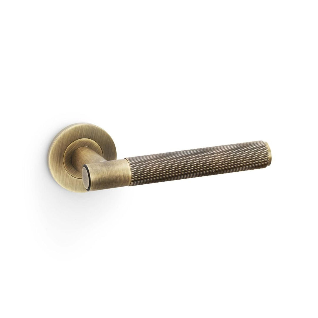 Spitfire Knurled Lever on Rose (A/W) Pair - Antique Brass (AB)